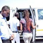 passengers get into a stabus van