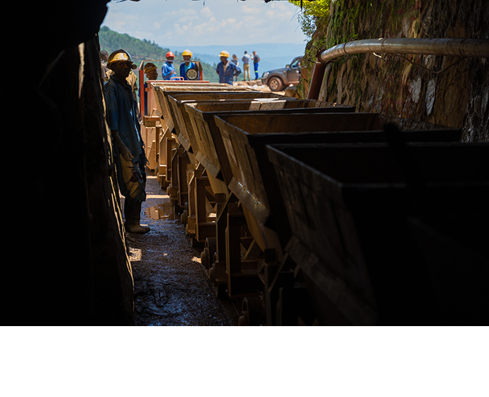 Carts of mineral ore are hauled out of a mine run by Rutongo Mines Ltd., north of Kigali, Rwanda. A team from Intel's Responsible Minerals Program, as well as representatives of other tech firms, visited mineral-rich Rwanda in November 2019 as part of an industry effort to ensure a legal and ethical supply chain. Tin, tanatalum, tungsten and gold mined in the Central African country are key components of silicon chips that run today's smartphones, laptops, servers and other high-tech gear. (Credit: Walden Kirsch/Intel Corporation)